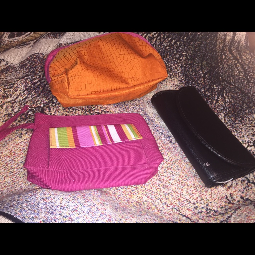 Three Make-up bags by Lancôme Paris.